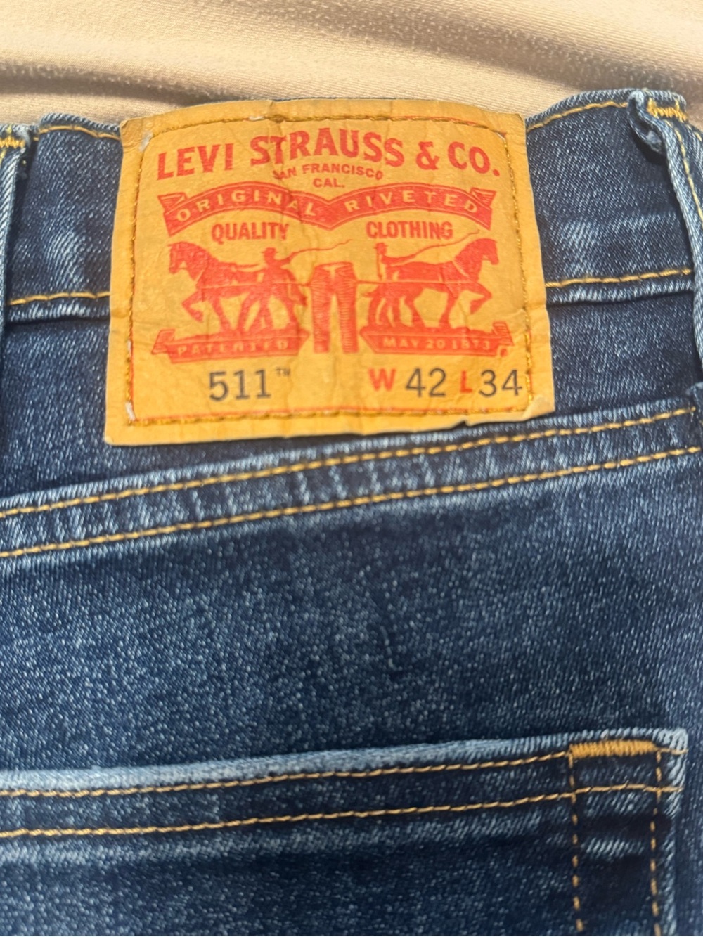 Levi's 511 Slim Jeans in Dark Blue with Tan Patch